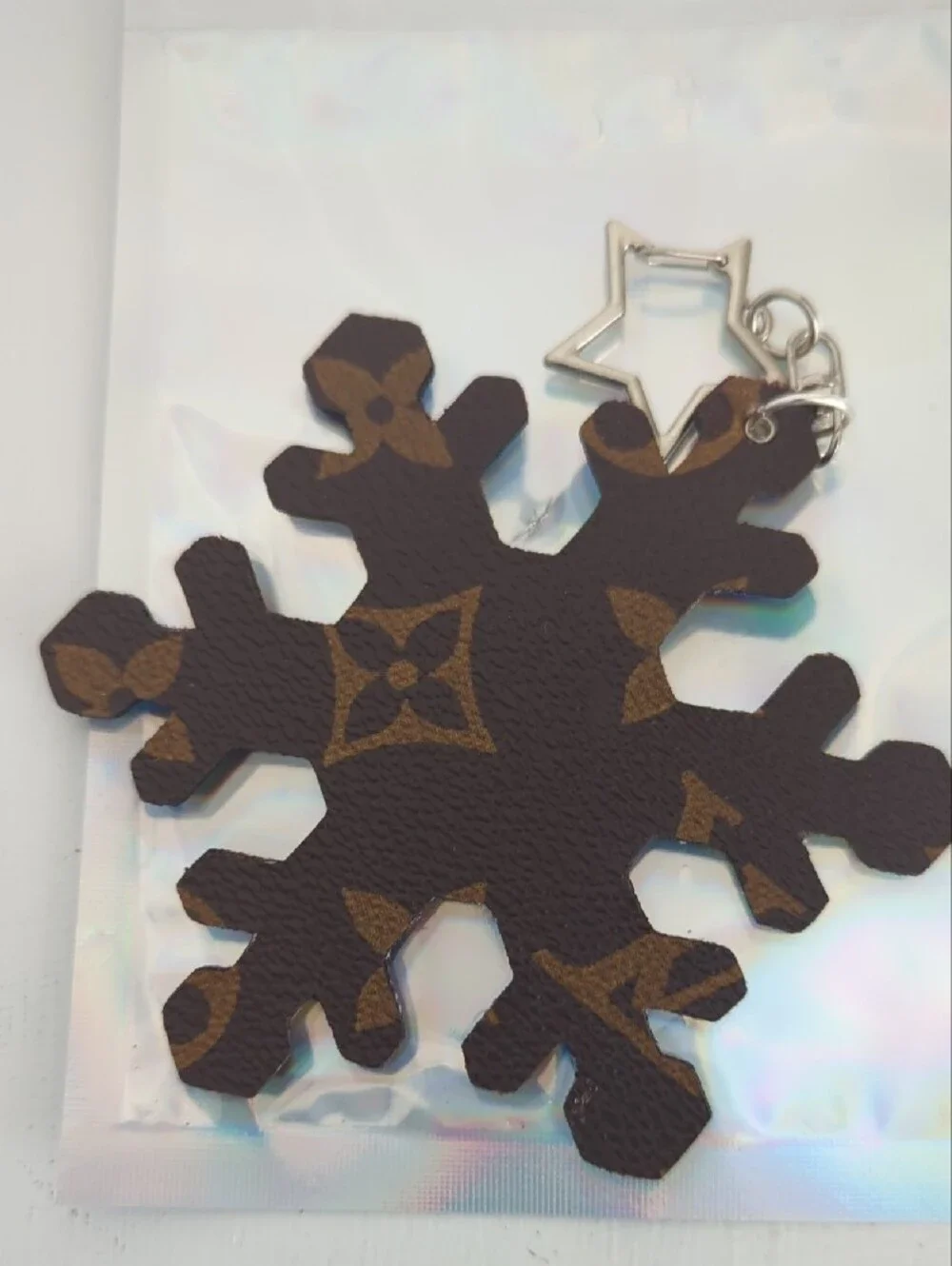 Louis Vuitton Brown Monogram Snowflake Key Charm with Silver Star Clasp COA Incl